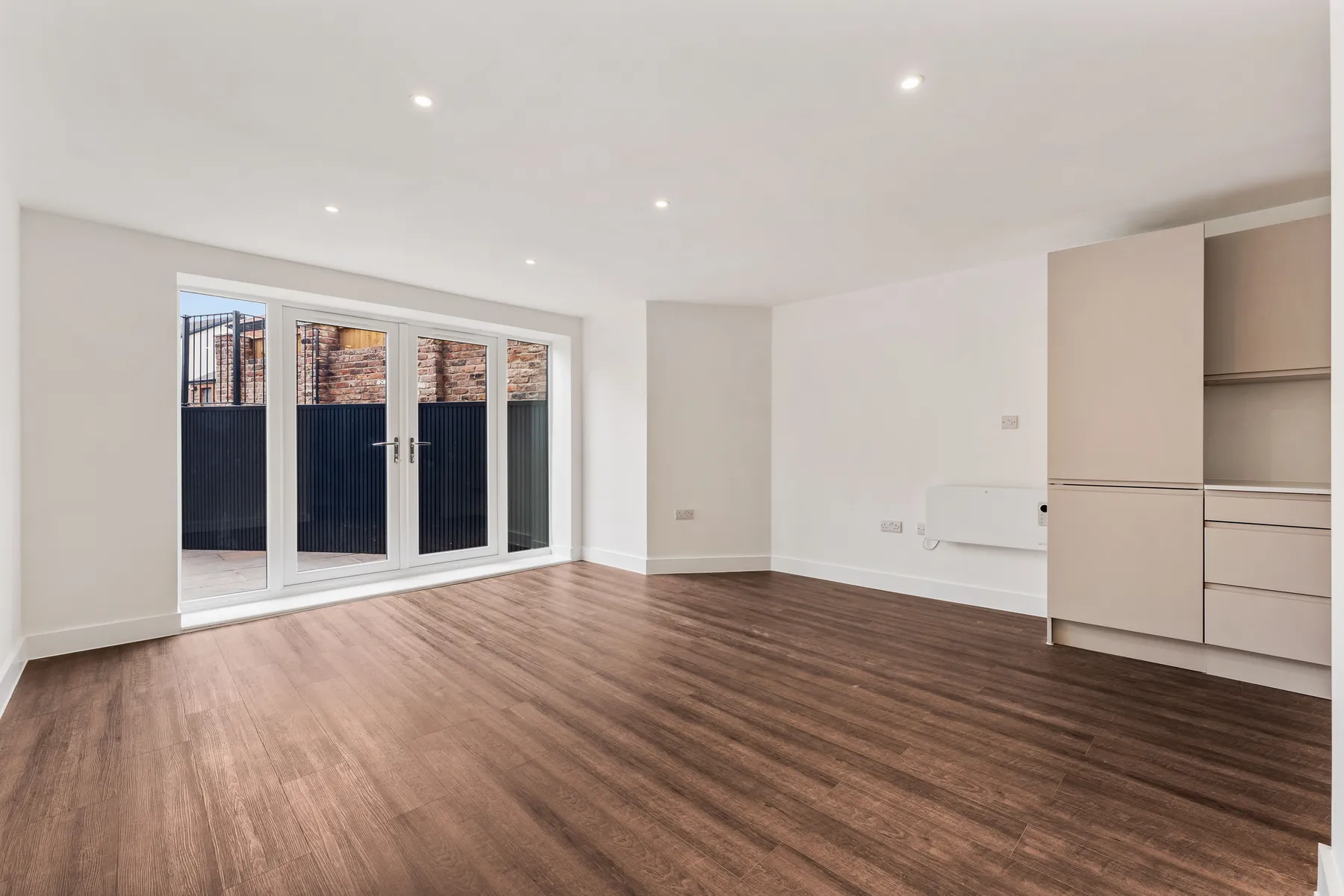 Bright completed interior with glazed garden doors