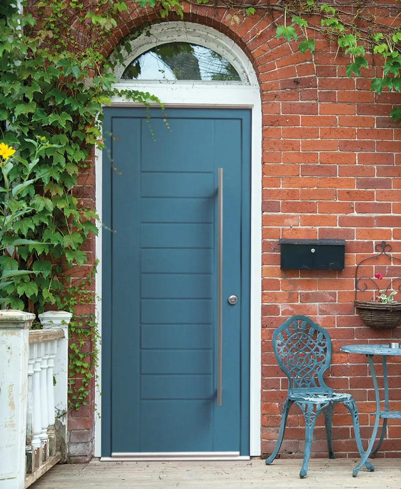Blue entrance door installation serving Rochdale
